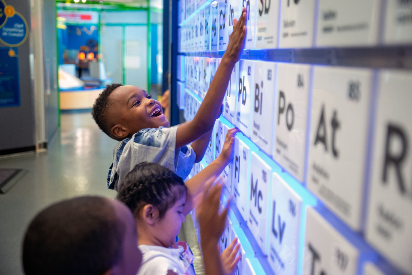 Children exploring the periodic table of elements at the Children's Museum Houston